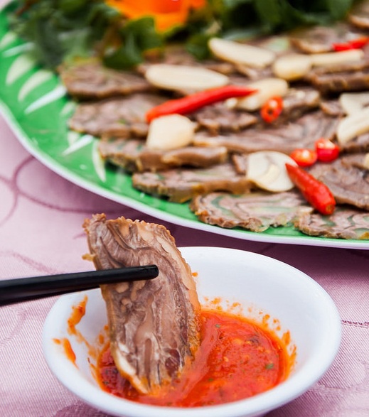 Food dipped in Muong Khuong hot sauce
